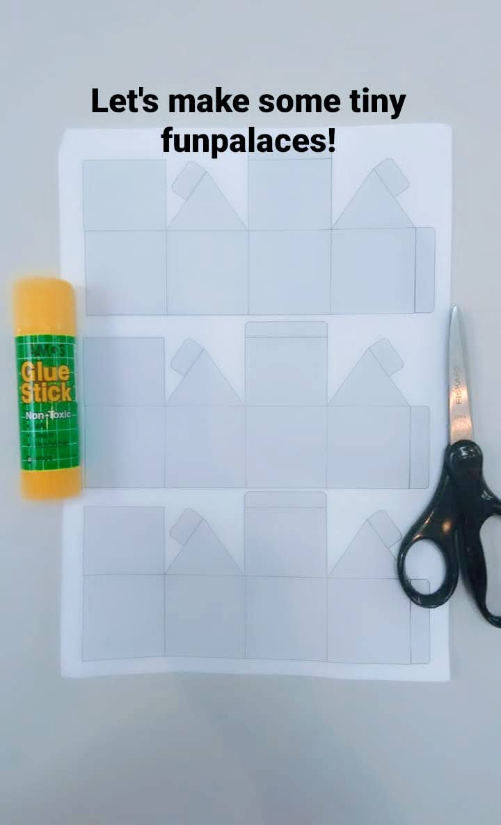 A glue stick, paper template for making the funpalace and scissors